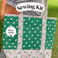 A person outdoors holding a quilted tote bag made from green floral fabric with pink trim. The bag has a front pocket and a white 'Sewing Kit' label overlay, with a circular 'PDF & VIDEO' badge on the left.