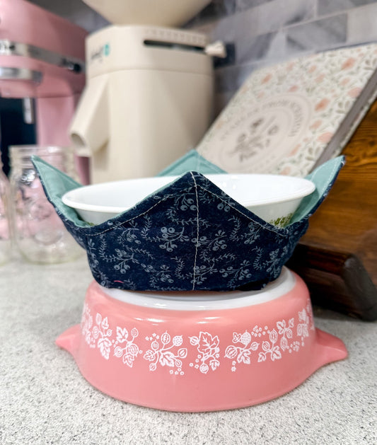 ceramic bowl in a navy blue leafy floral bowl cozy