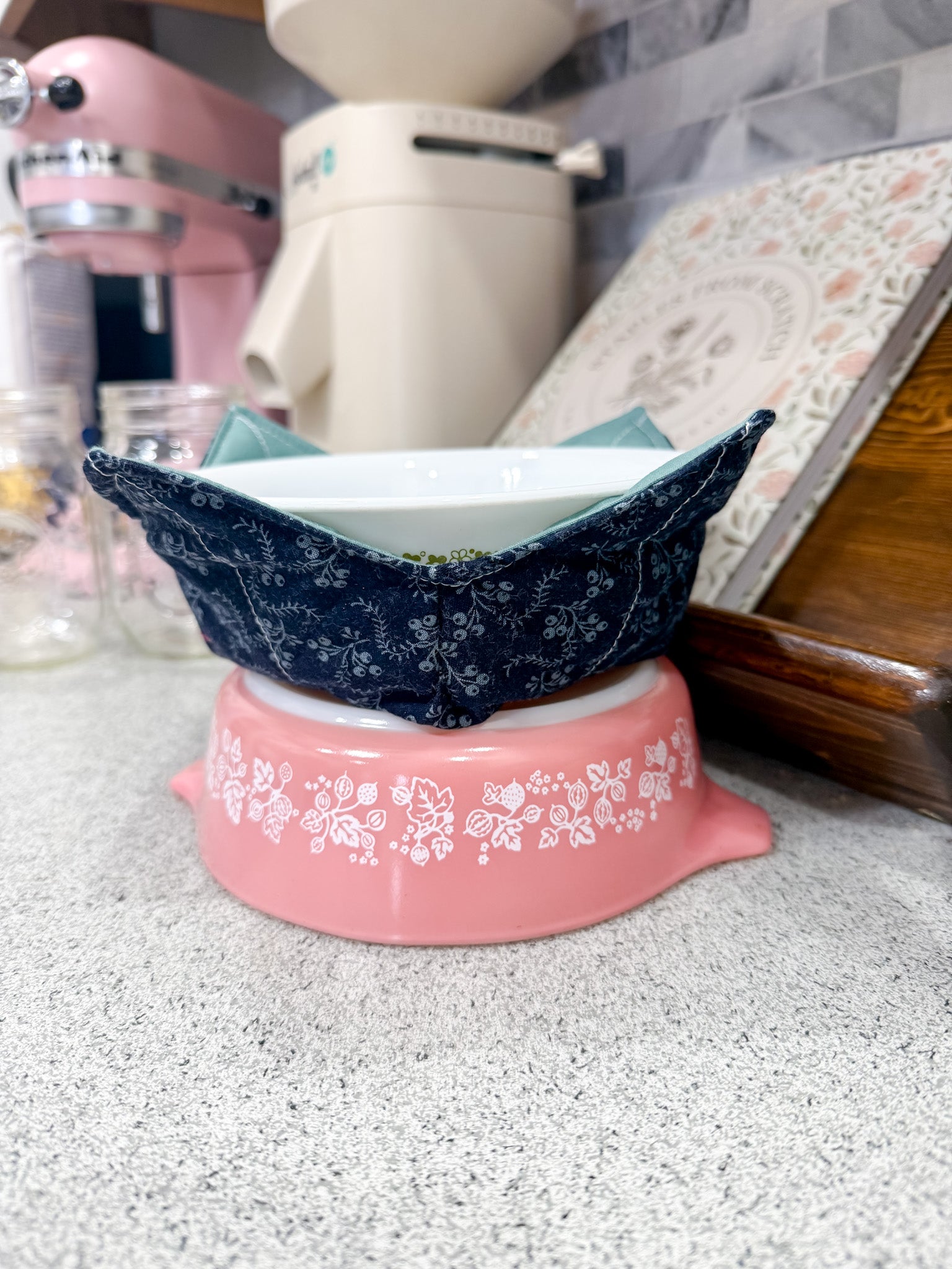 Pink and blue ceramic bowls on a countertop