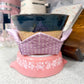 Ceramic bowl with a pink base on a kitchen counter