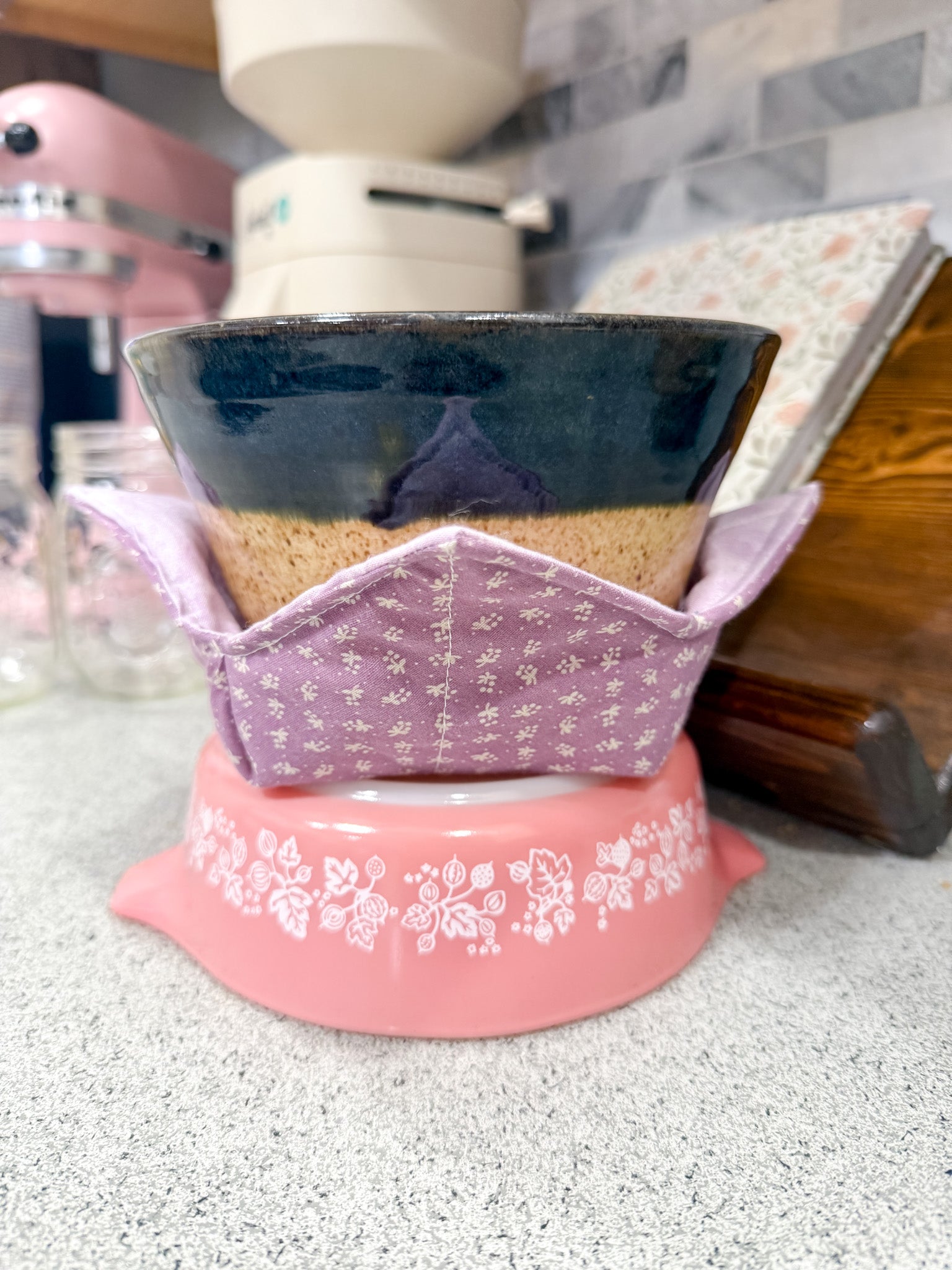 Ceramic bowl with a pink base on a kitchen counter