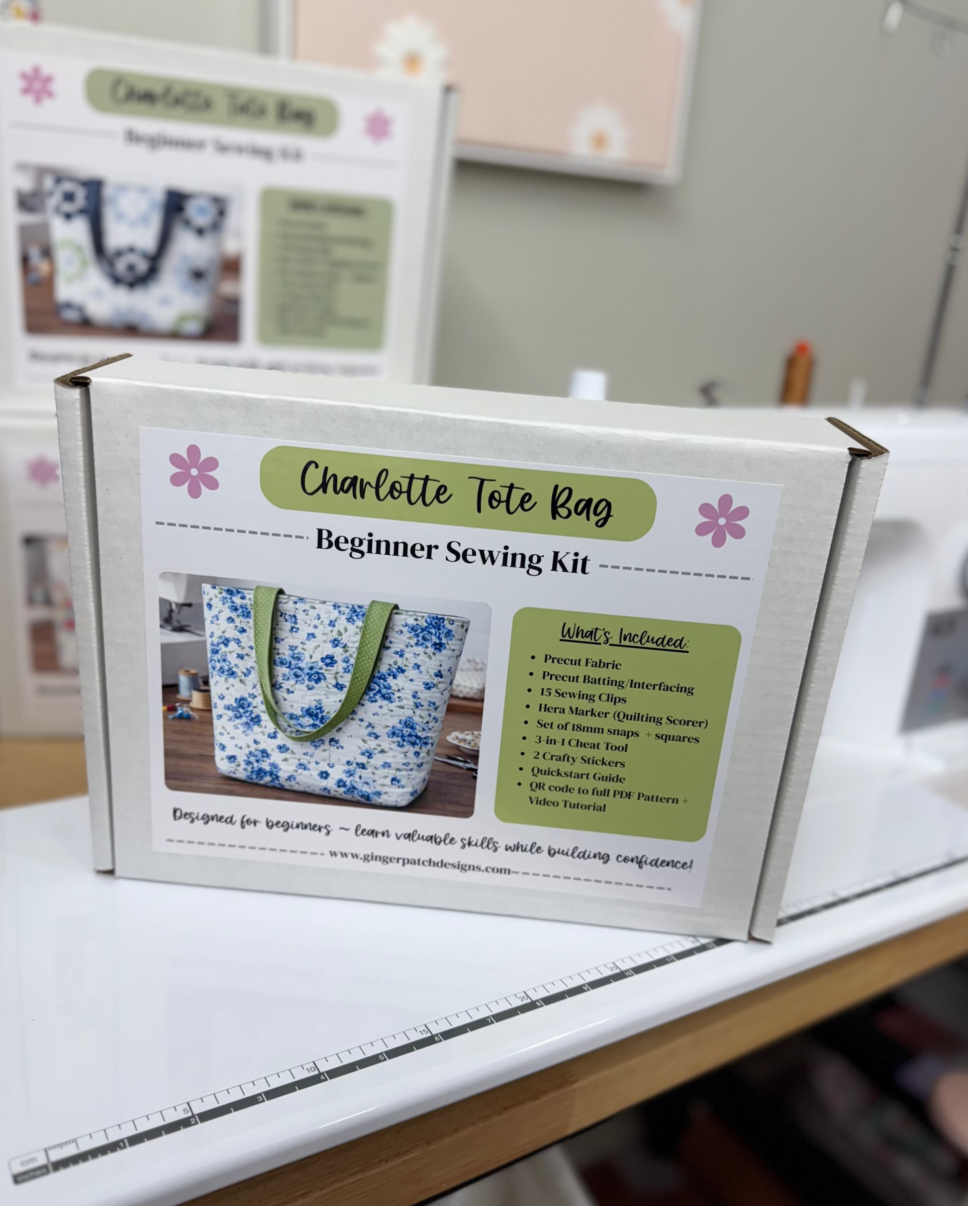 Charlotte Tole Bag Beginner Sewing Kit on a table with sewing machine in the background
