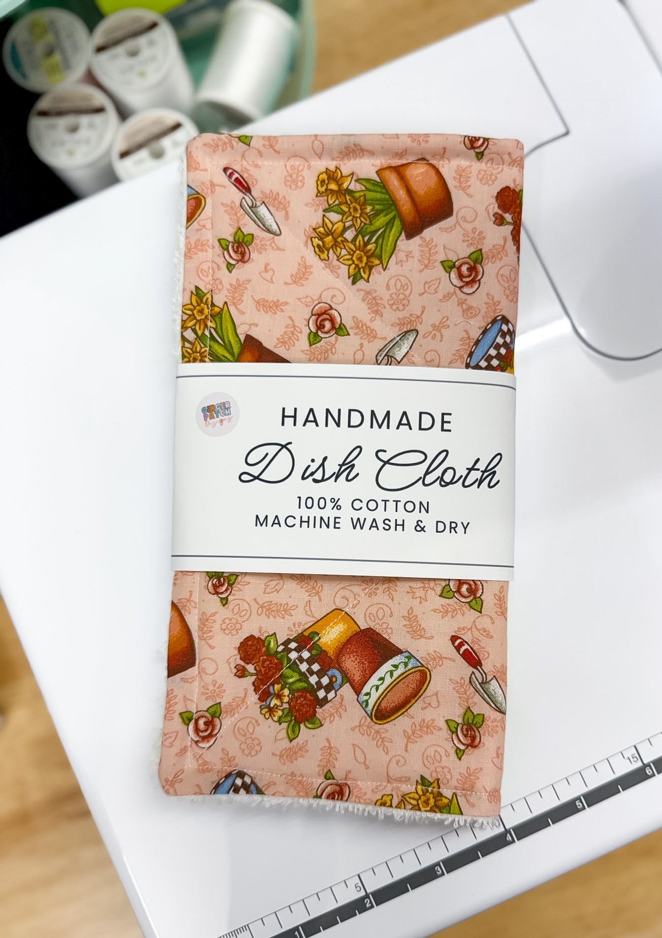 Handmade dish cloth packaging with a pattern on a white surface