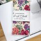 Handmade dish cloth packaging with floral design on a sewing machine