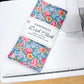 Handmade dish cloth with floral pattern on a cutting mat