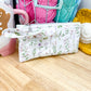 White Wildflower Flat Quilted Bow Pouch