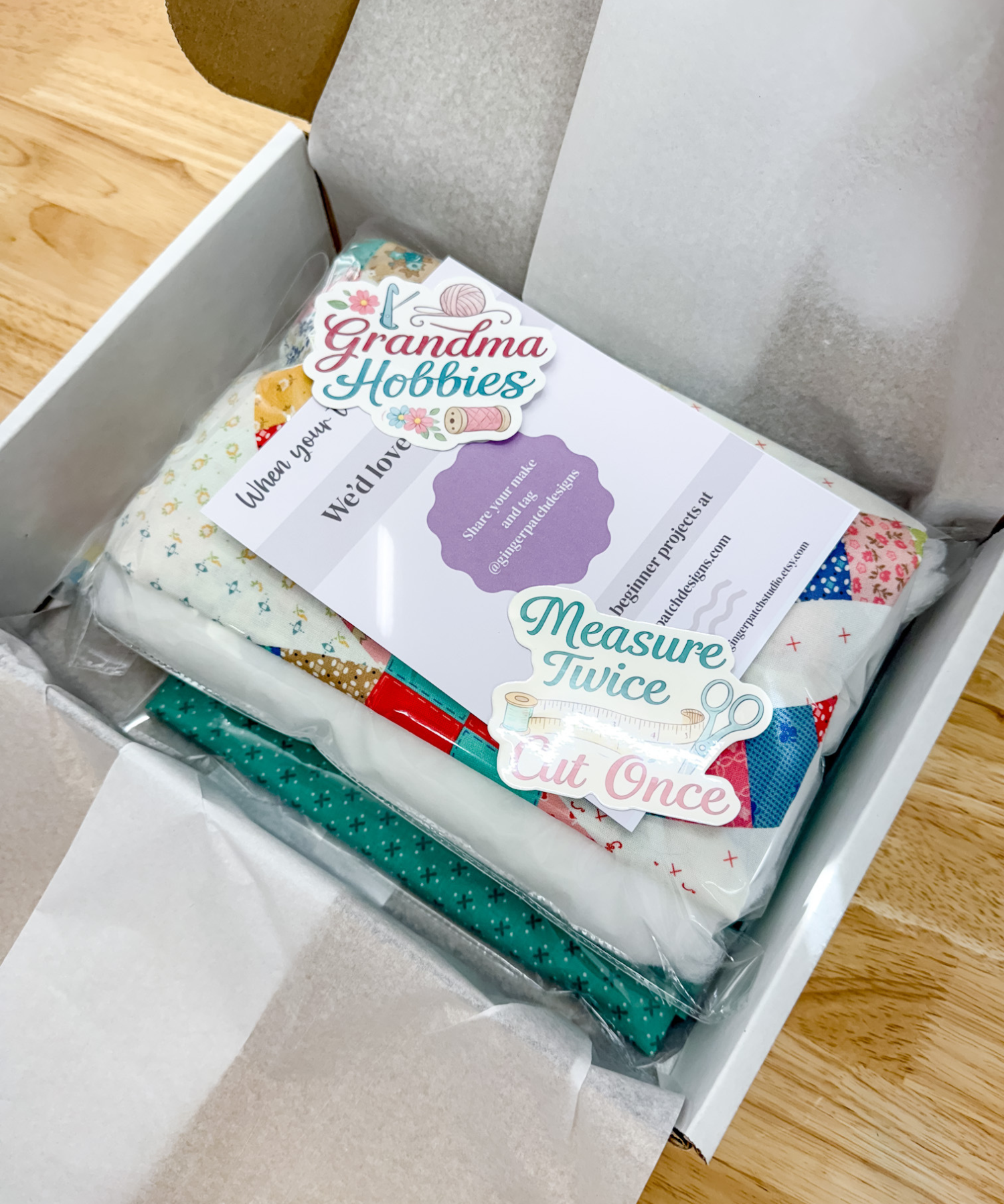 Packaged product from Grandma Hobbies with text and branding on a wooden surface